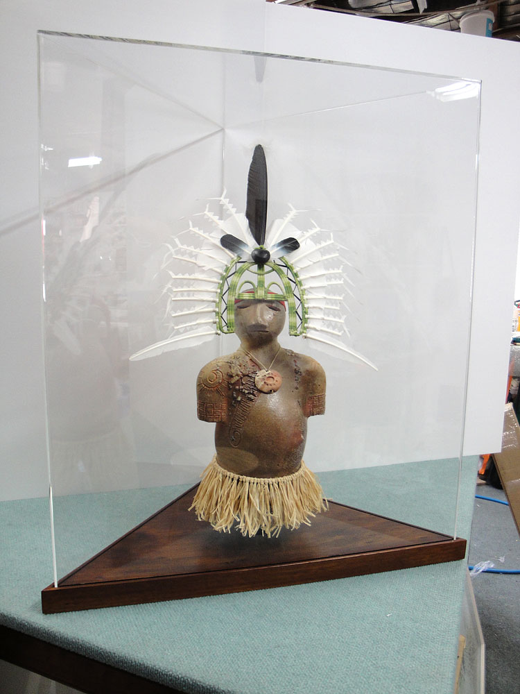 Thursday Island ceramic figure in display case