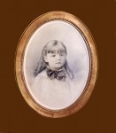 Gilt oval frame on 19thc pencil portrait